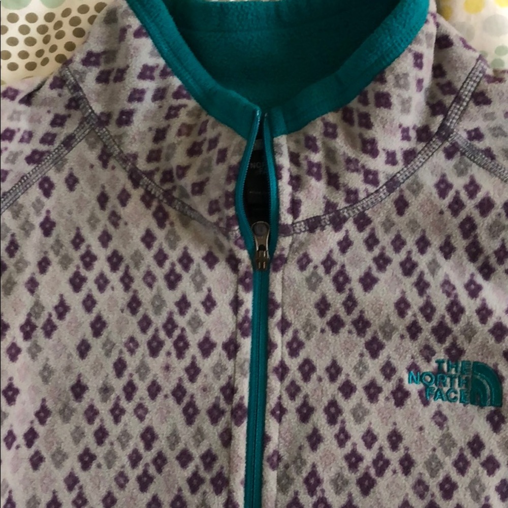 North Face half zip pull over.